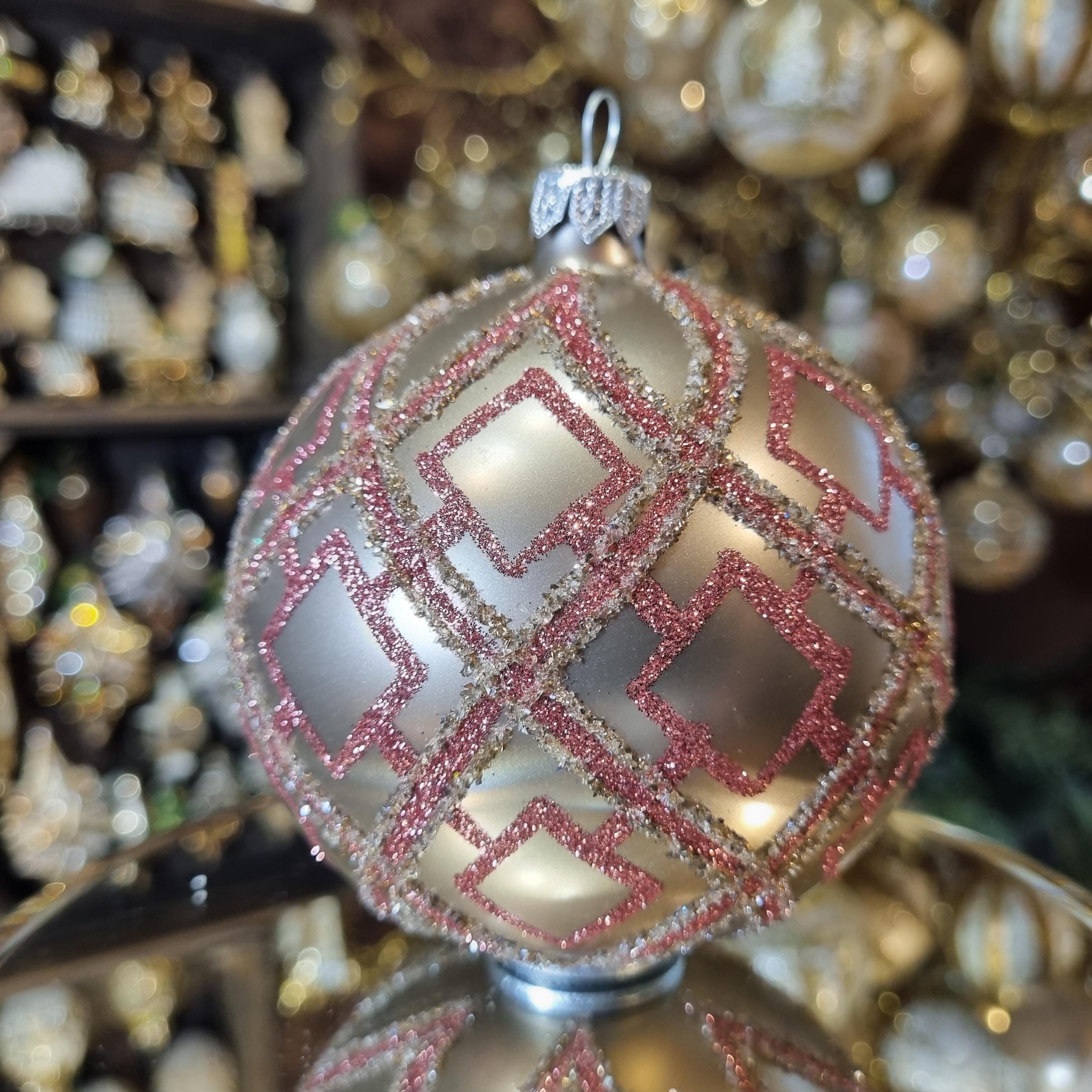 Silverado ornament, glass ball with red decorative pattern