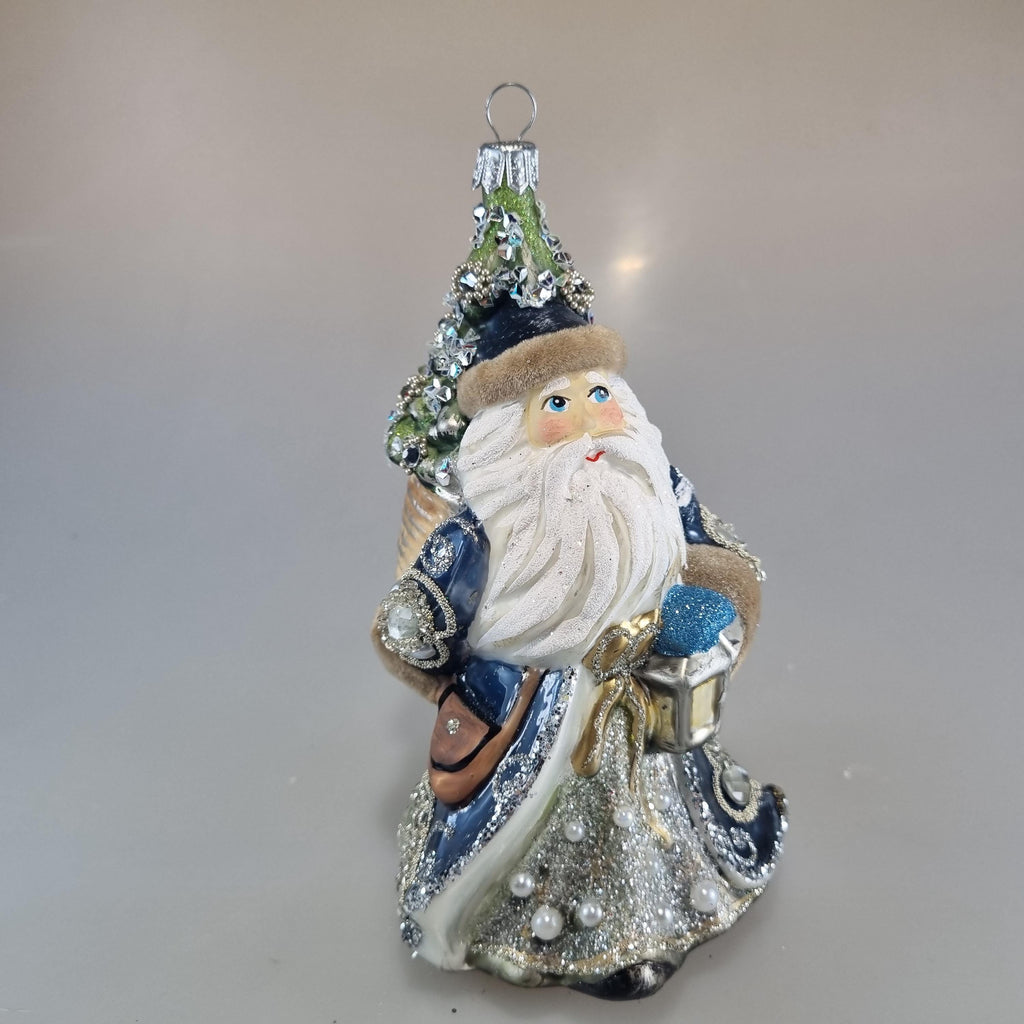 Santa Claus with Christmas Tree on His Back