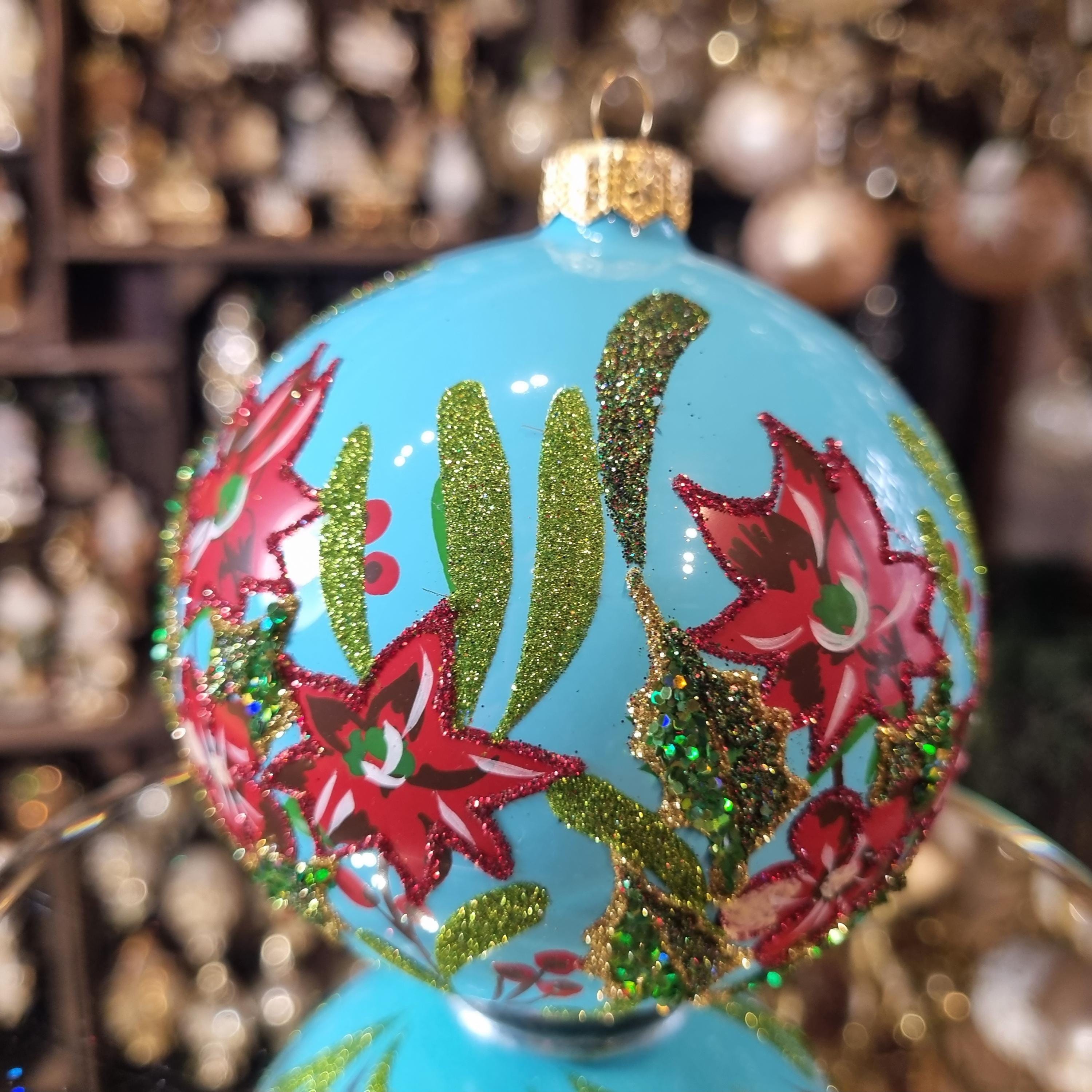 Silverado glass ornament. blue ball with classic decorative motif