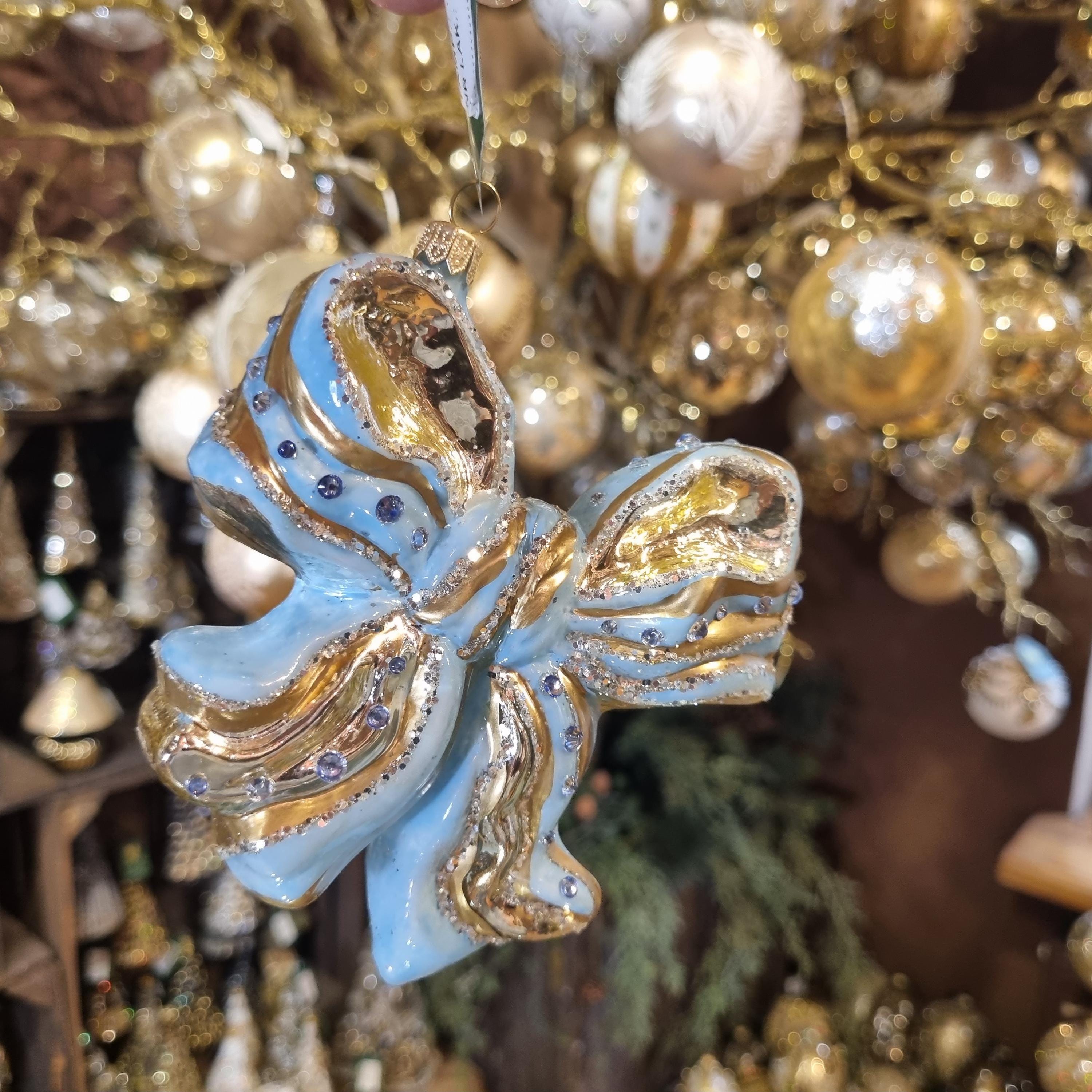 Silverado glass ornament, green ball with decorative gold pattern